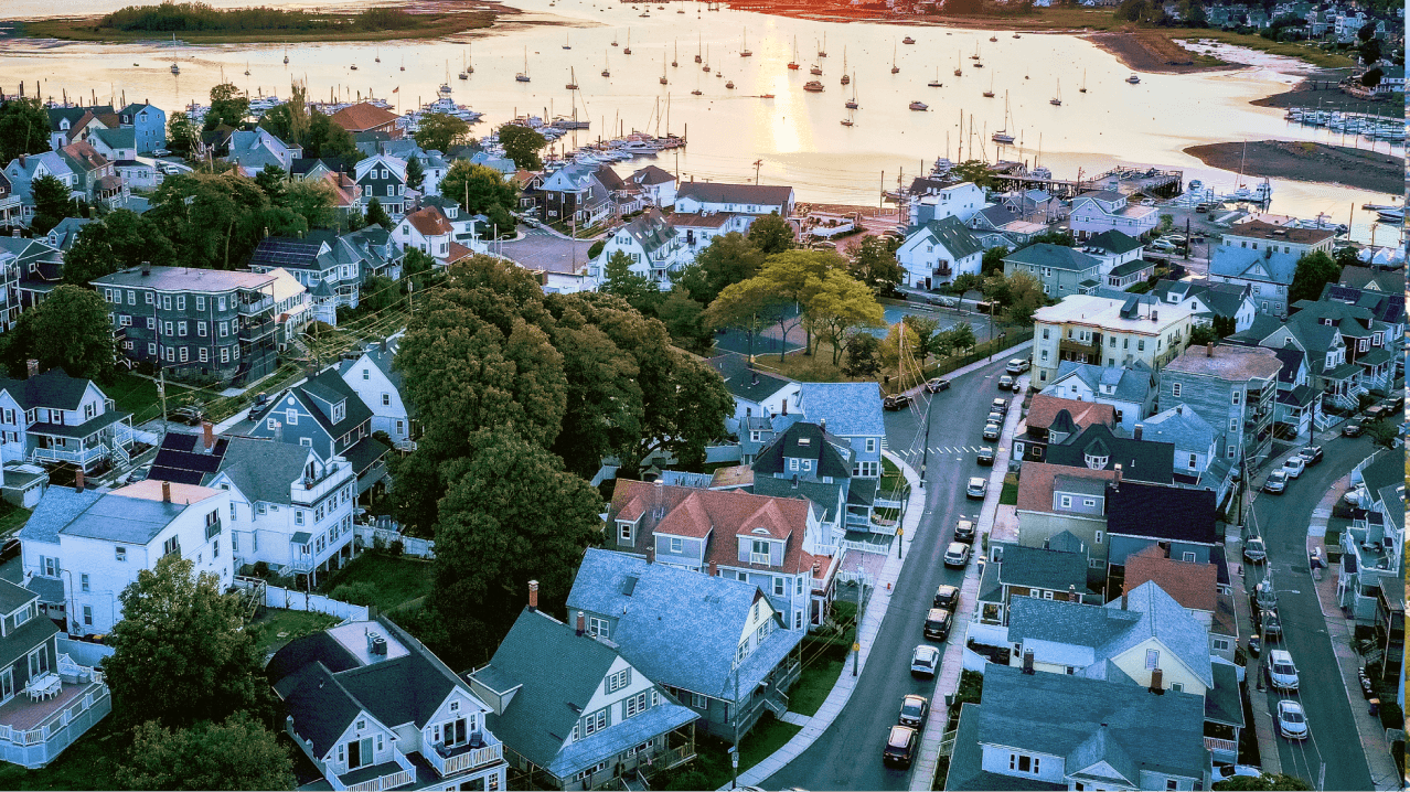 A Brookline harbor with residential buildings.