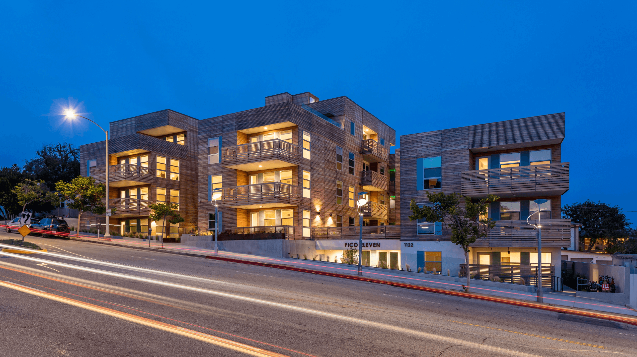 A modern multi-family housing structure named Pico Eleven.